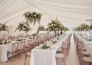 beautiful wedding marquee. long wedding tables wedding flowers
